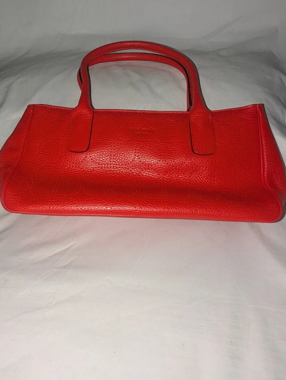 Kate Spade New York  Noel Rue Red Pebbled Perforated Leather Tote Bag.